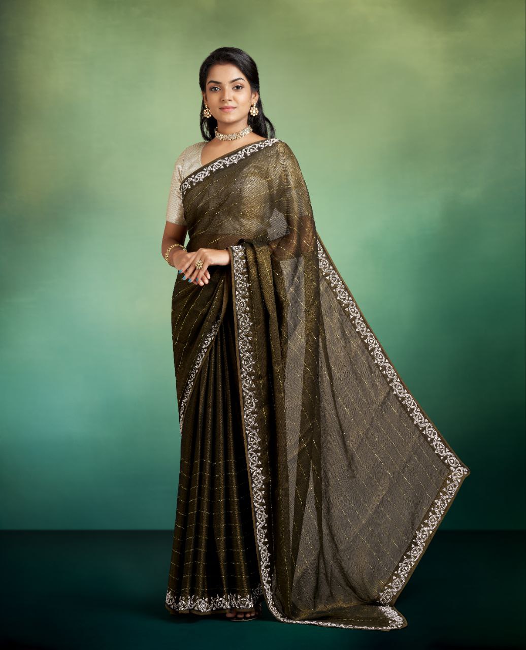 Mahendi Green Color Net Saree with Stonework Border