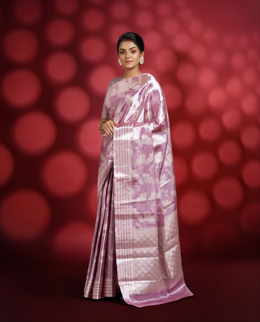 Purple Color Tissue Saree With Silver Color Floral Design